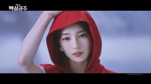 Suzy sings the Korean soundtrack of the musical film Snow White Courtesy of Walt Disney Company