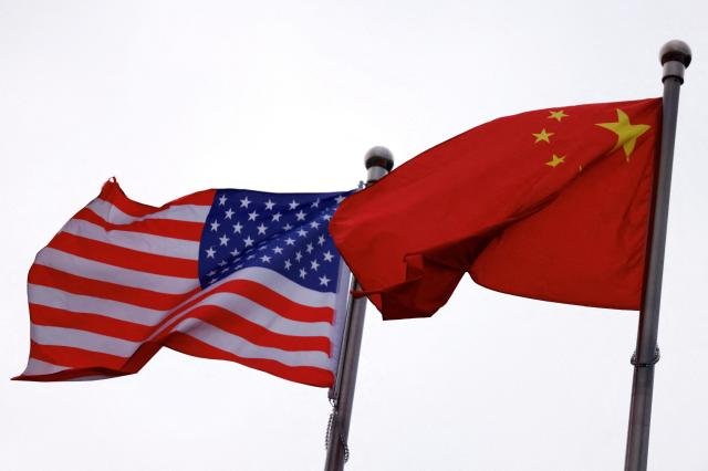 US and China flags Reuters-Yonhap