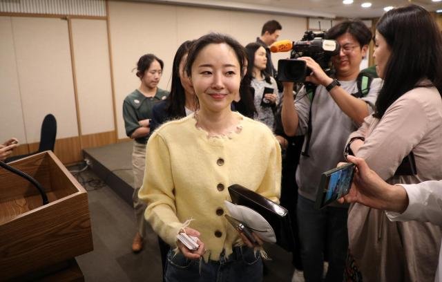 Min Hee-jin then CEO of ADOR leaves a press conference after an extraordinary shareholders meeting at the Korea Press Center in central Seoul on May 31 2023 Joint Press Corps