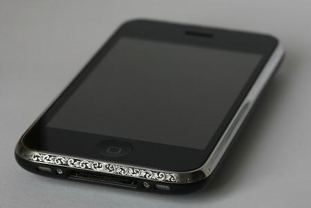 1288603252_iphone_hand_engraving_steel_bezel_art_450x301_soccer231.jpg