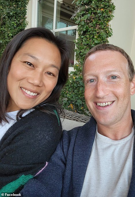 51845993-10314439-The_Facebook_CEO_and_founder_pictured_with_his_wife_Priscilla_Ch-a-34_1639765168588.jpg