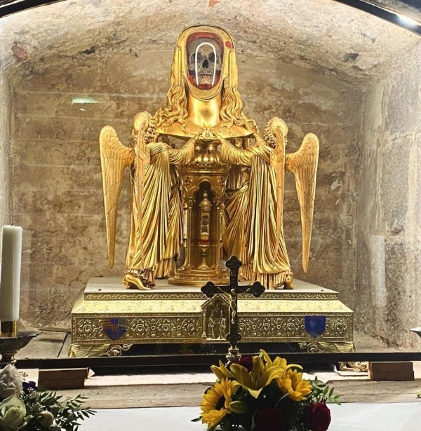 The purported skull of Mary Magdalene displayed in a golden reliquary at the basilica of Saint-Maximin-la-Sainte-Baume, in Southern France   The skull was analyzed in 1974 and has remained sealed inside (1).jpg